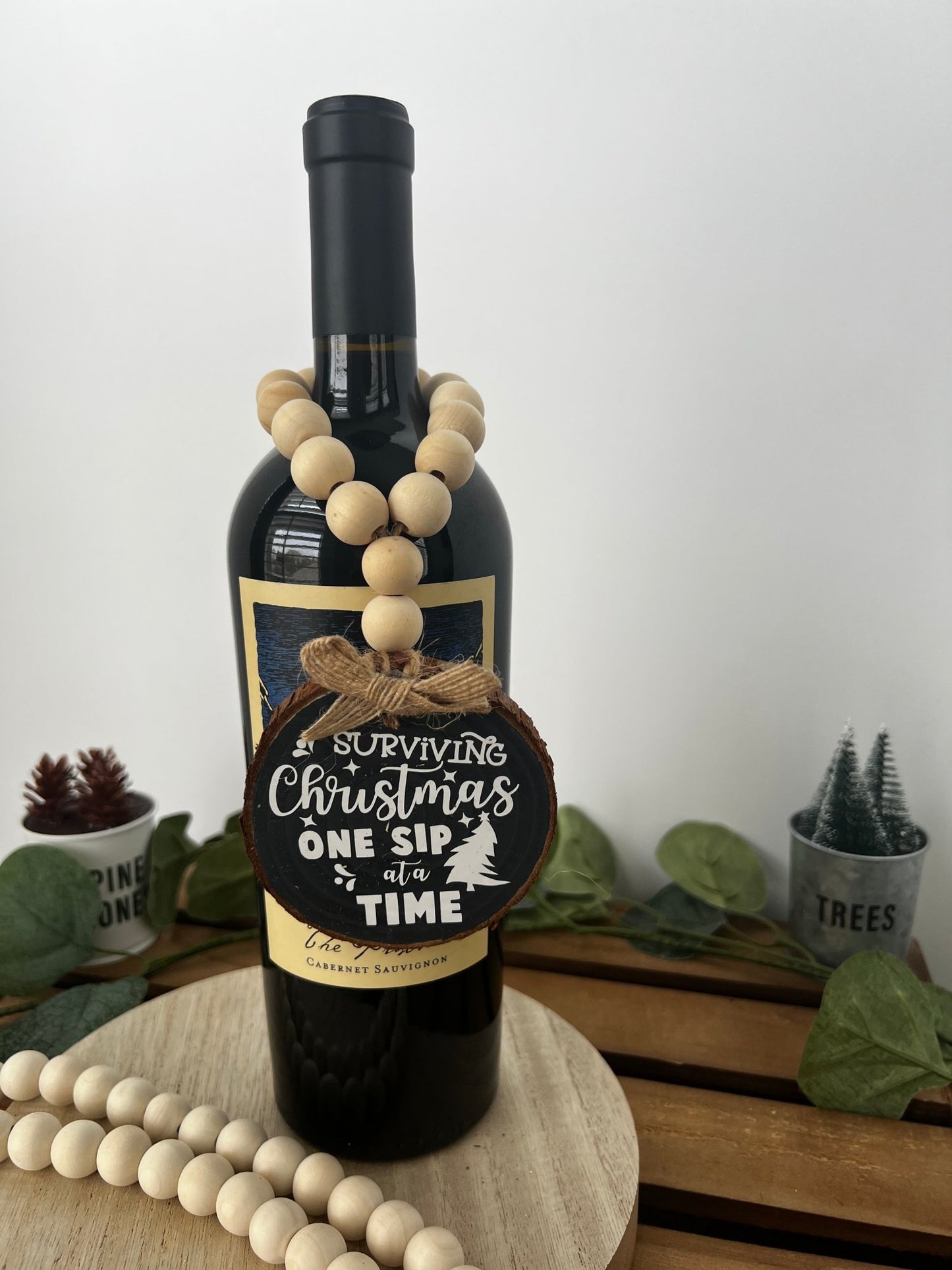 Wine Bottle Hang Tag with Wood Bead - Surviving Christmas One Sip at a Time - ChambrayandSandCustomGifts