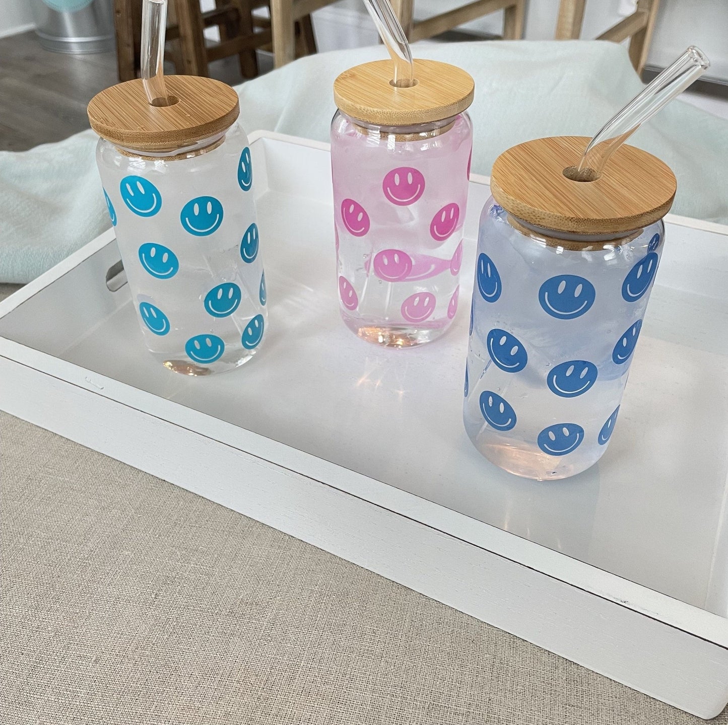 https://chambrayandsand.myshopify.com/cdn/shop/products/smiley-beer-can-color-changing-glass-color-changing-glass-multiple-color-options-beer-can-glass-with-bamboo-lid-835733.jpg?v=1693308213&width=1445